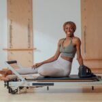 Scopri i benefici del Pilates Barre per un corpo tonico e flessibile con il programma dedicato
