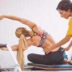 Esercizi Cadillac Pilates Esegui gli esercizi Cadillac Pilates per migliorare la tua flessibilità e forza