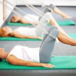 Esercizi Pilates Da Parete Esercizi Pilates da parete: allenati con efficacia e comfort a casa tua
