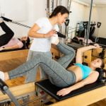 Macchina Cadillac Pilates Scopri la potenza e l'eleganza della macchina Cadillac Pilates di Cadillac